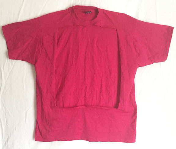 Pink shirt with front design cut out.